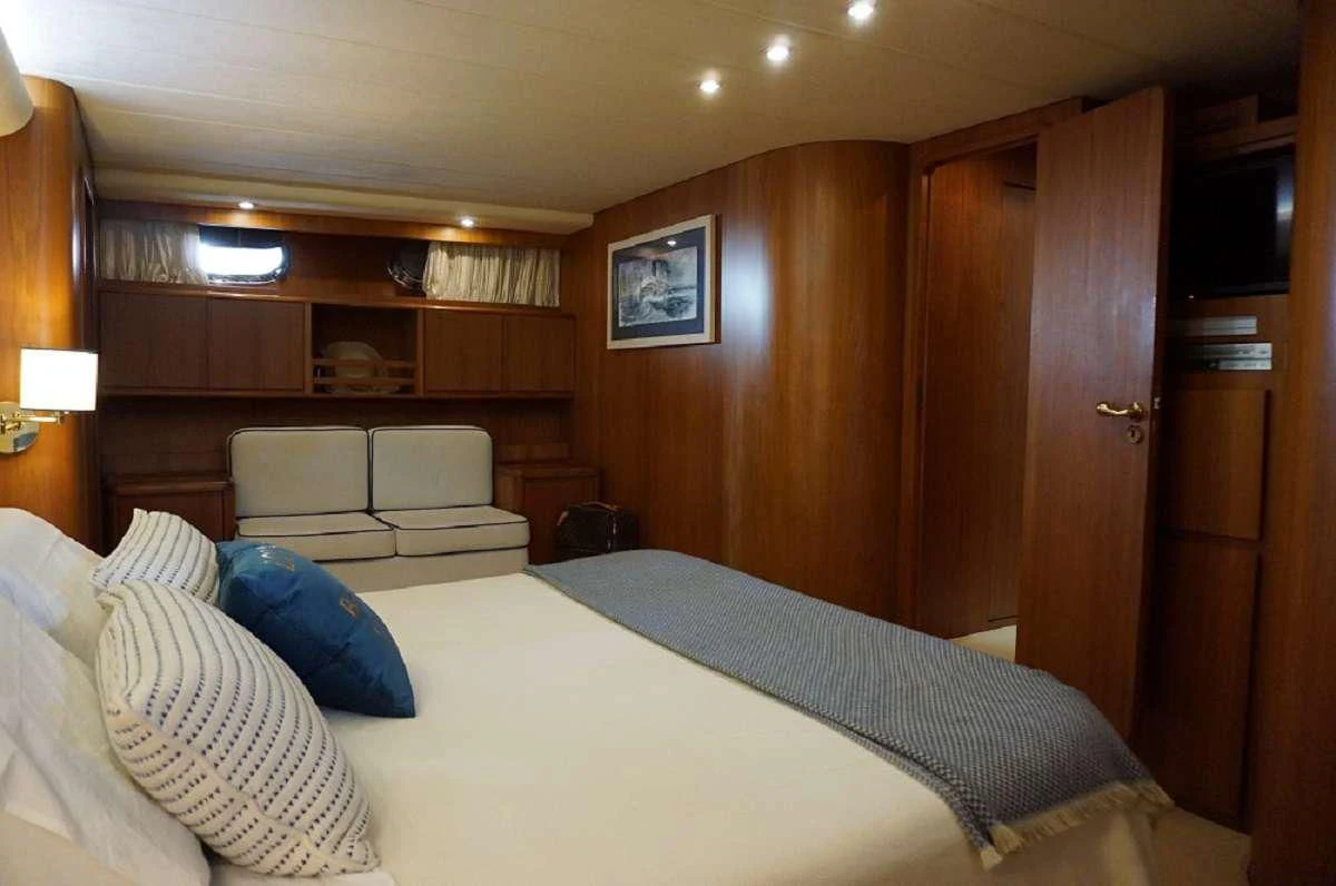a bed in a room aboard BALU 3 Yacht for Sale