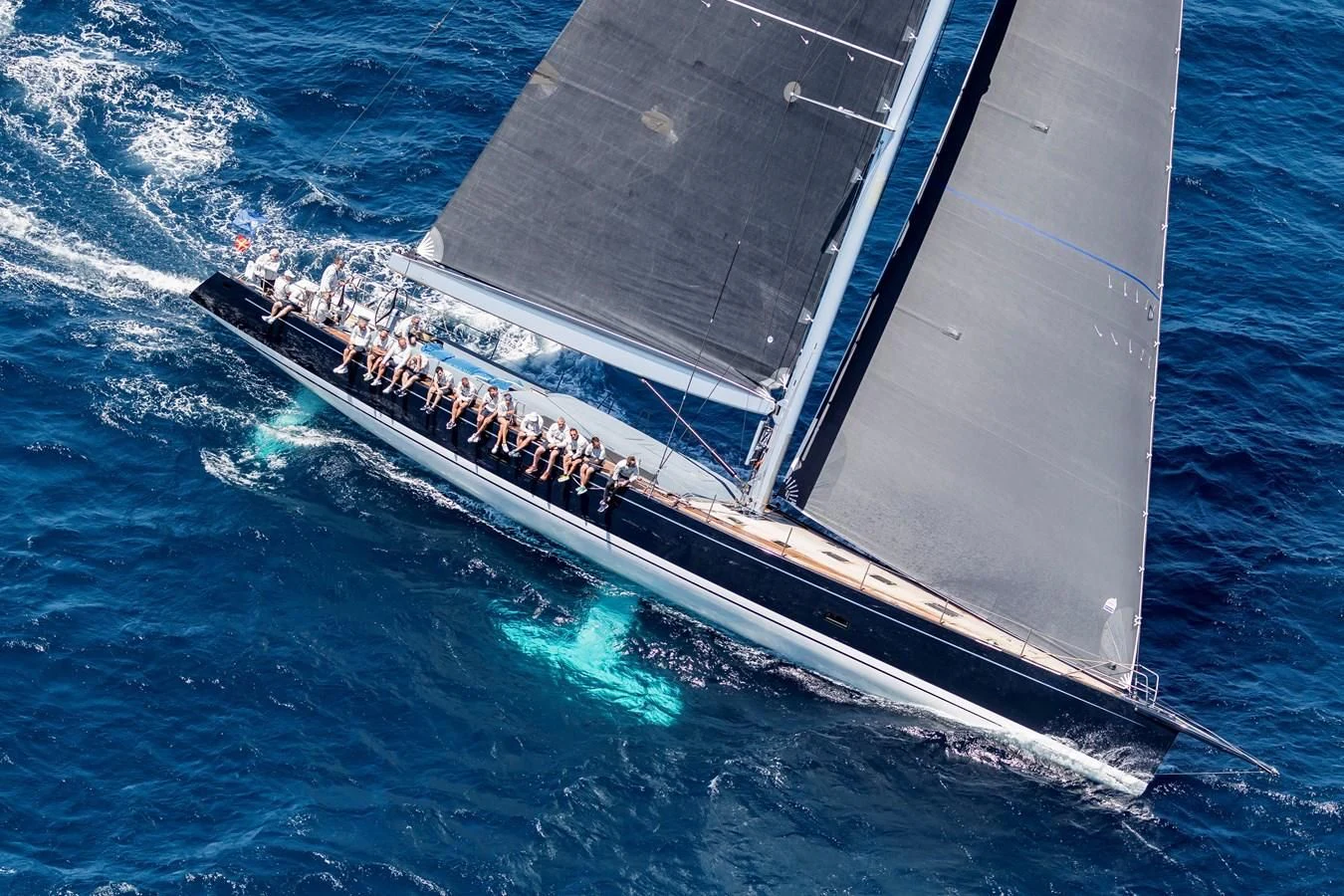 a group of people on a boat aboard MAGIC BLUE Yacht for Sale