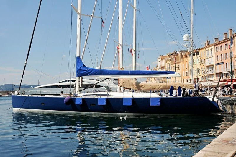 a boat docked in a harbor aboard MAGIC BLUE Yacht for Sale