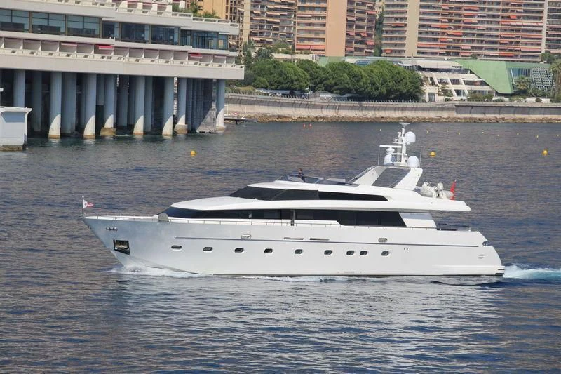 a white boat on the water aboard ALPHA PAPA Yacht for Sale