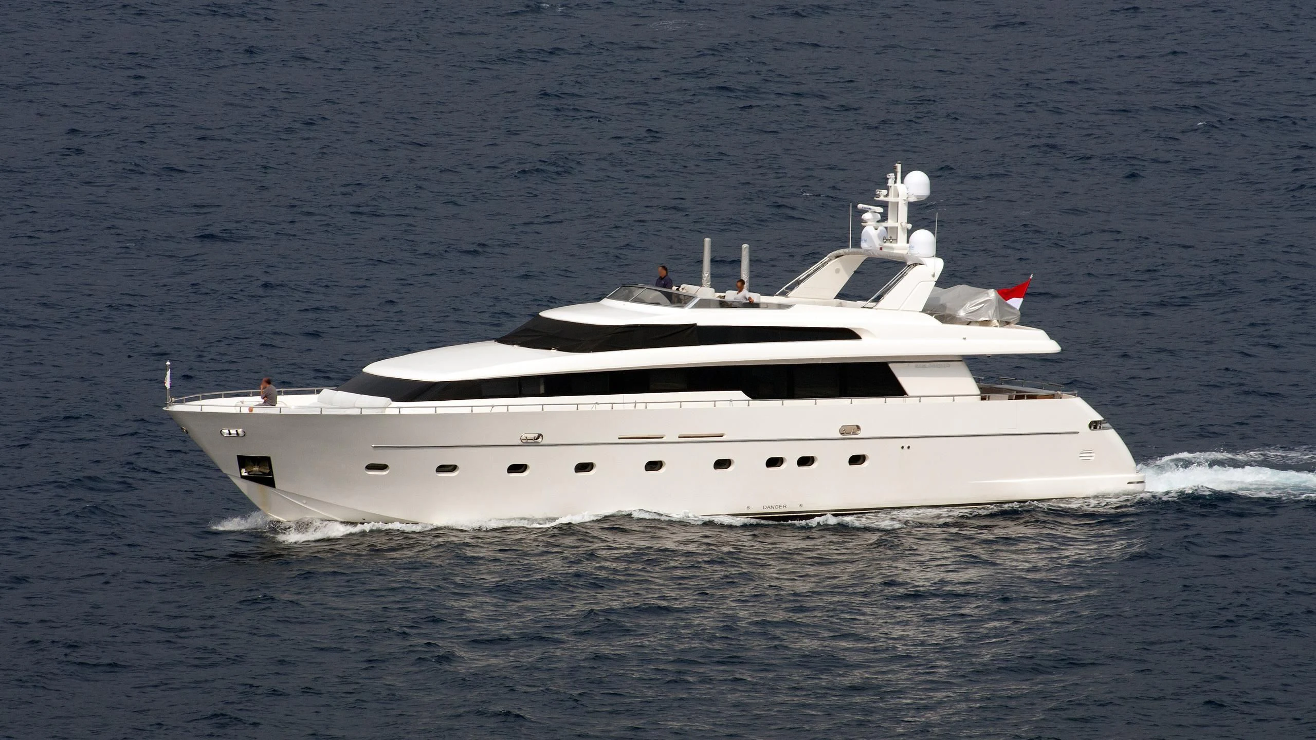 a white yacht in the water aboard ALPHA PAPA Yacht for Sale