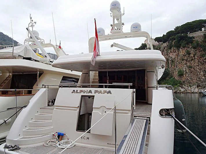 a boat docked at a pier aboard ALPHA PAPA Yacht for Sale