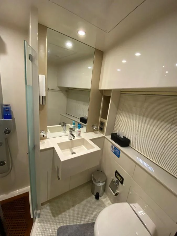 a bathroom with a sink and a toilet aboard SERDAL Yacht for Sale