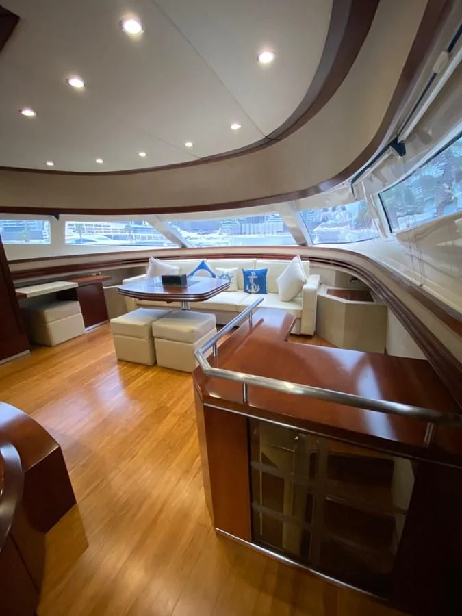 a room with a table and chairs aboard SERDAL Yacht for Sale