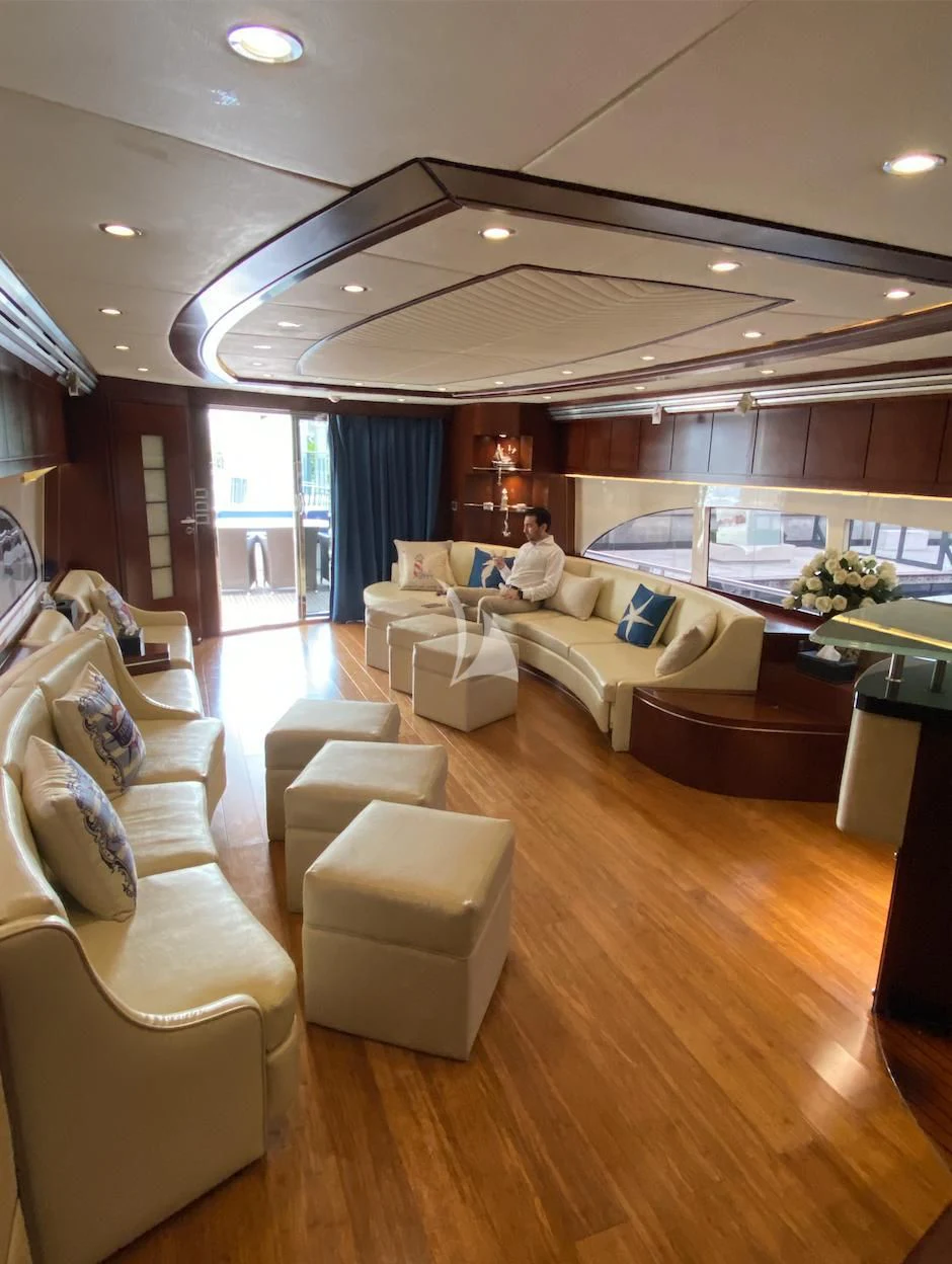 a living room with a large window aboard SERDAL Yacht for Sale