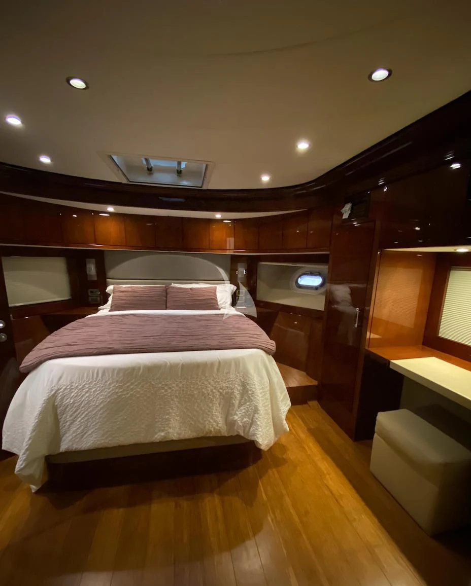 a room with a bed and a desk aboard SERDAL Yacht for Sale