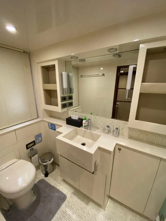 a bathroom with a large mirror aboard SERDAL Yacht for Sale