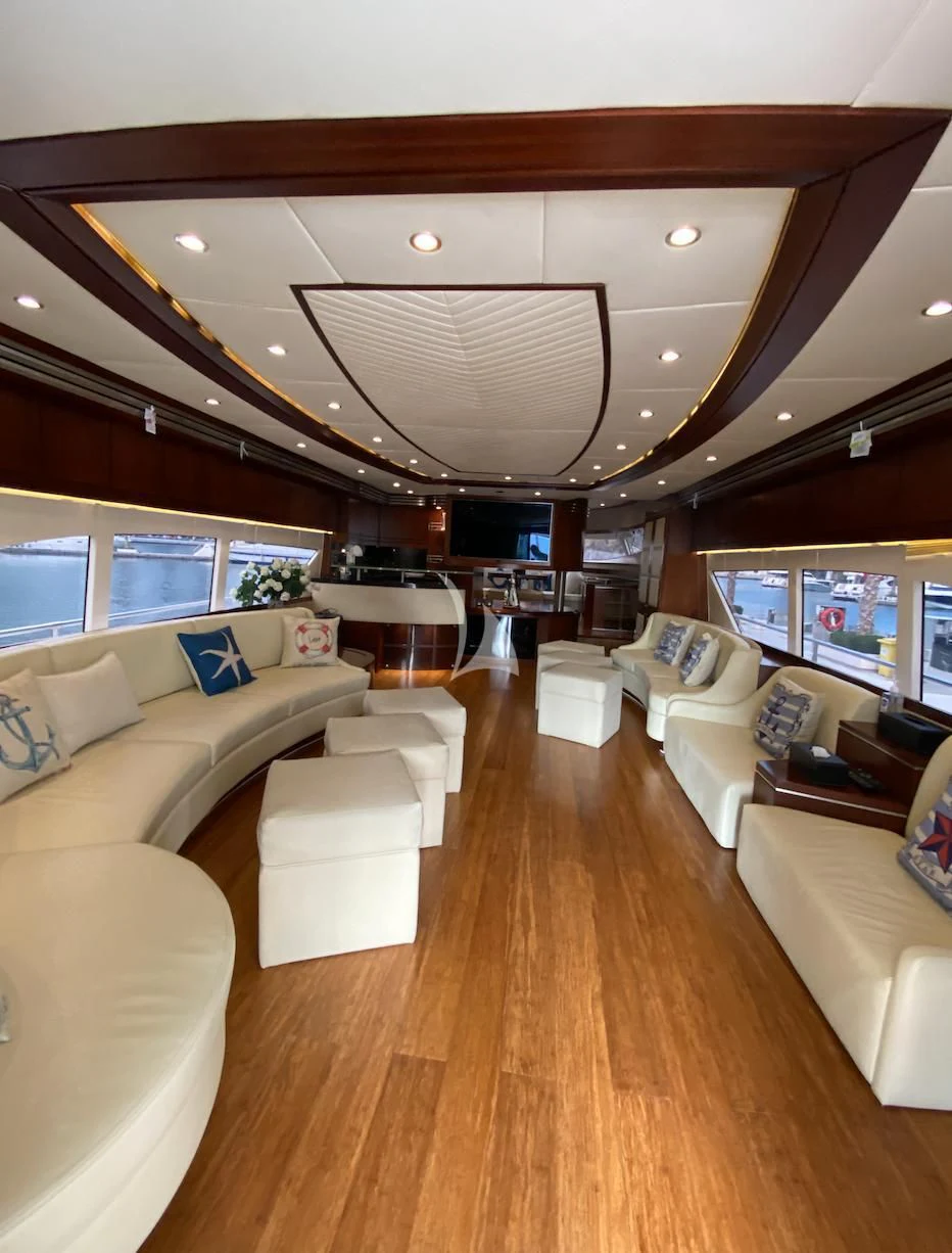 a living room with a large window aboard SERDAL Yacht for Sale