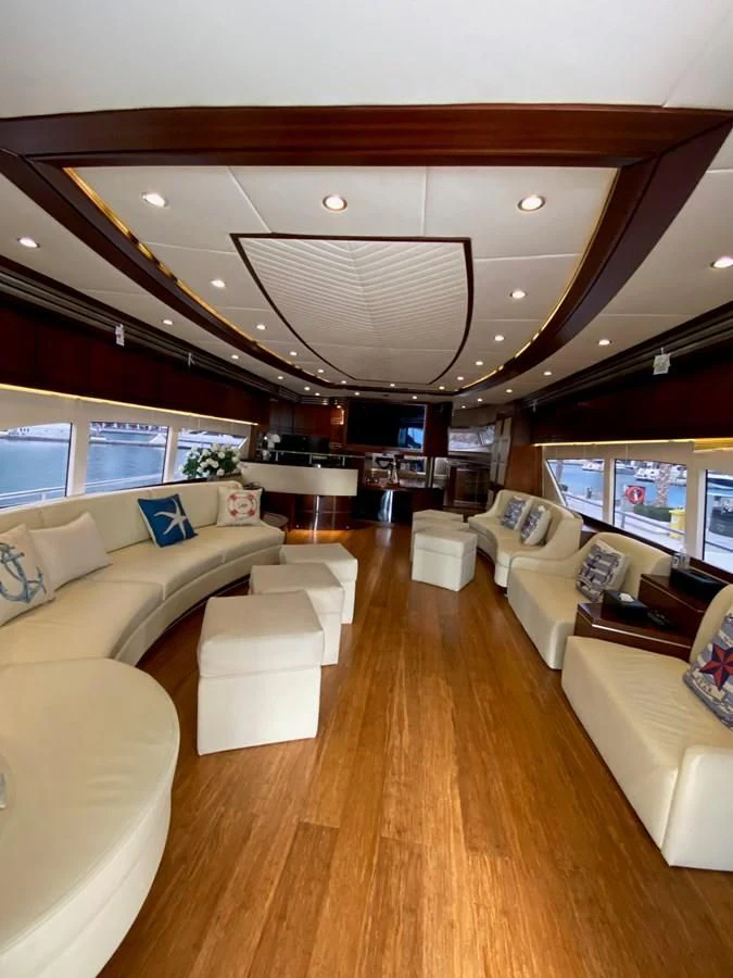 a living room with a large window aboard SERDAL Yacht for Sale