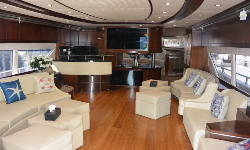 a living room with a large window aboard SERDAL Yacht for Sale