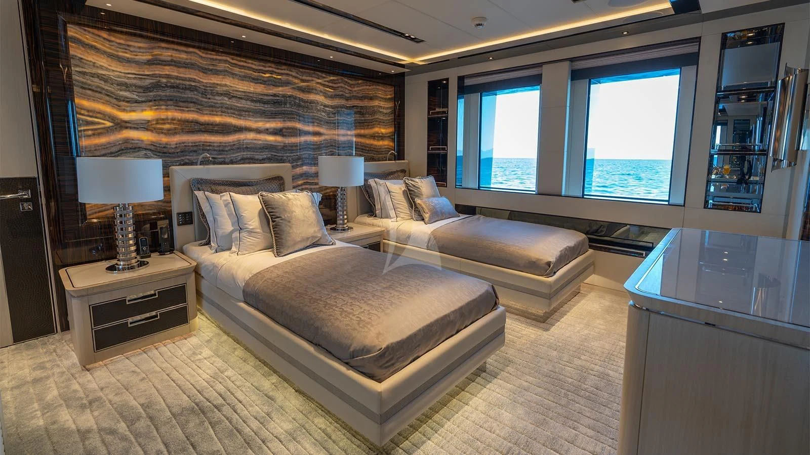 a large bedroom with a large bed aboard TATIANA Yacht for Sale