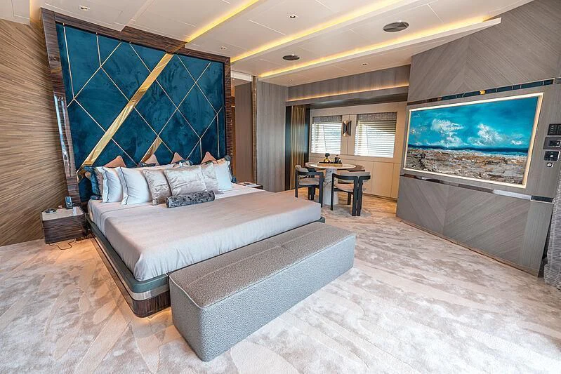 a bed in a room aboard TATIANA Yacht for Sale