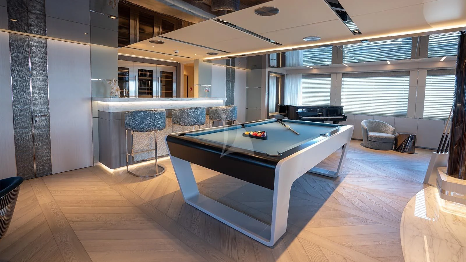 a large room with a pool table aboard TATIANA Yacht for Sale