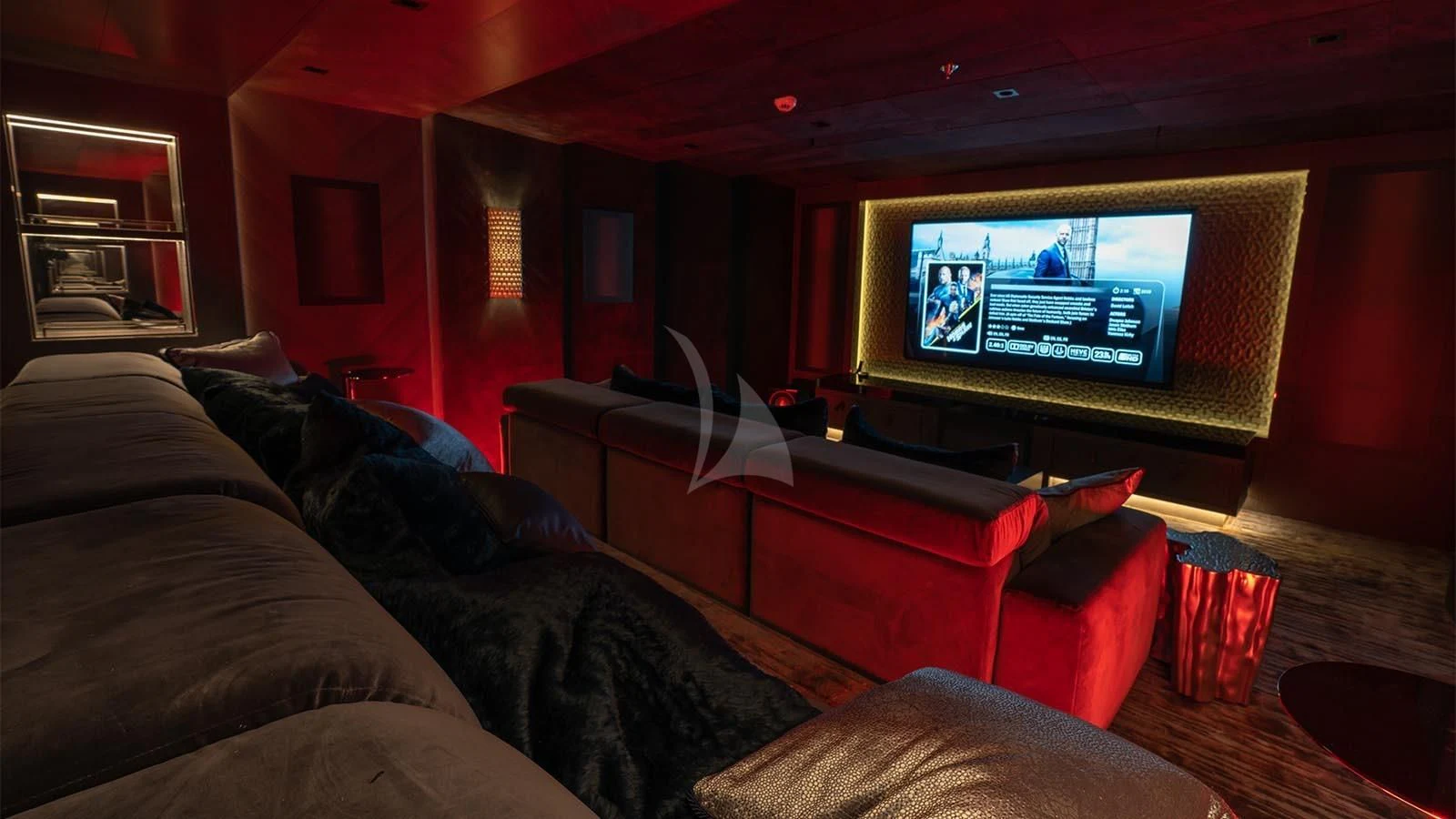 a living room with a tv aboard TATIANA Yacht for Sale