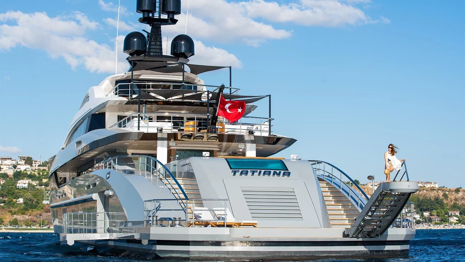 a person sitting on a boat aboard TATIANA Yacht for Sale
