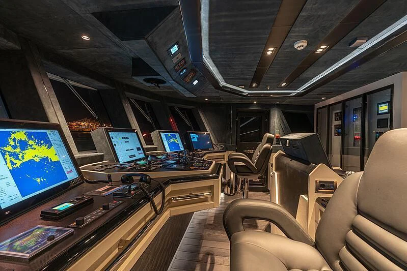 a control room with several screens aboard TATIANA Yacht for Sale