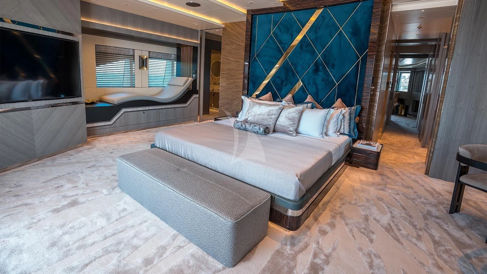 a large bed in a room aboard TATIANA Yacht for Sale