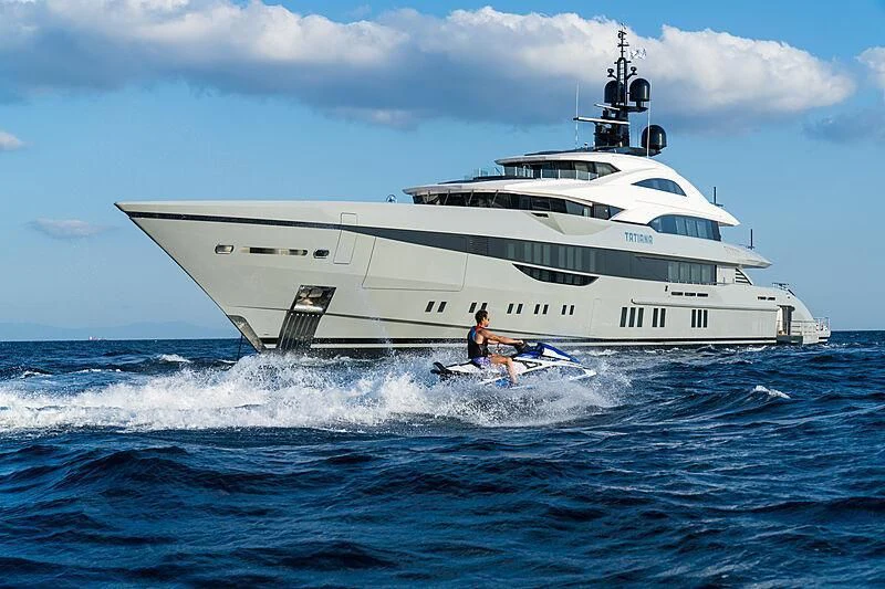 a person on a jet ski in the ocean aboard TATIANA Yacht for Sale