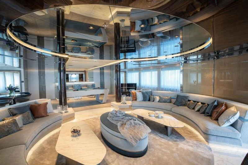 a large living room with a large open roof aboard TATIANA Yacht for Sale