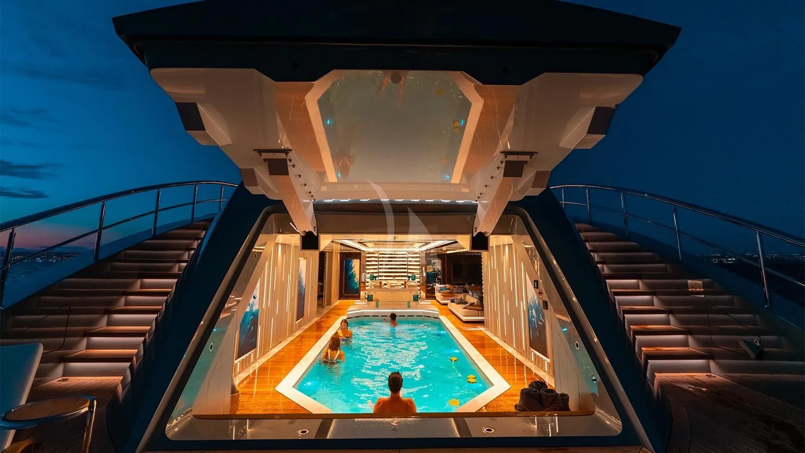 a swimming pool in a house aboard TATIANA Yacht for Sale