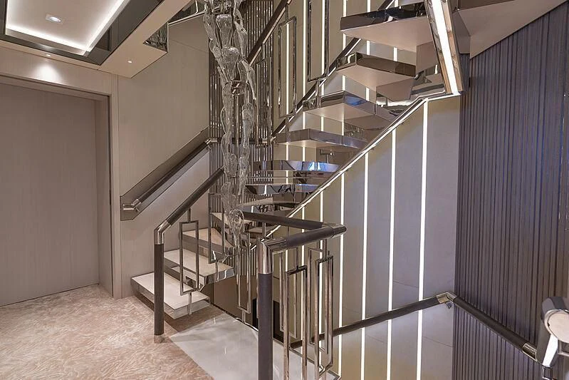 a large metal staircase in a building aboard TATIANA Yacht for Sale