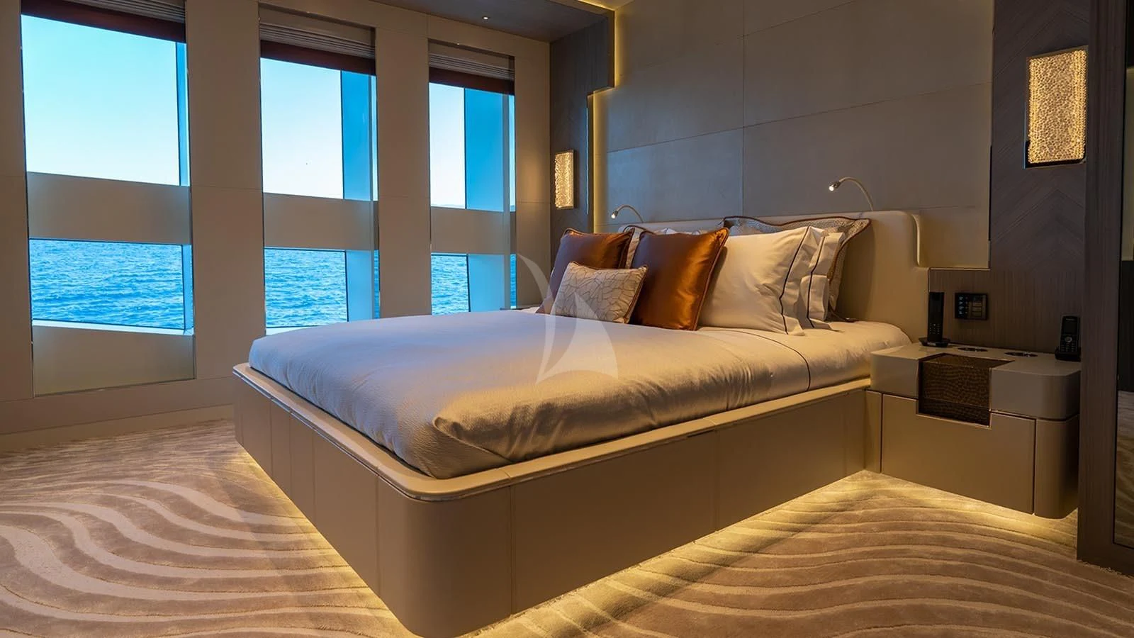 a room with a bed and a window aboard TATIANA Yacht for Sale