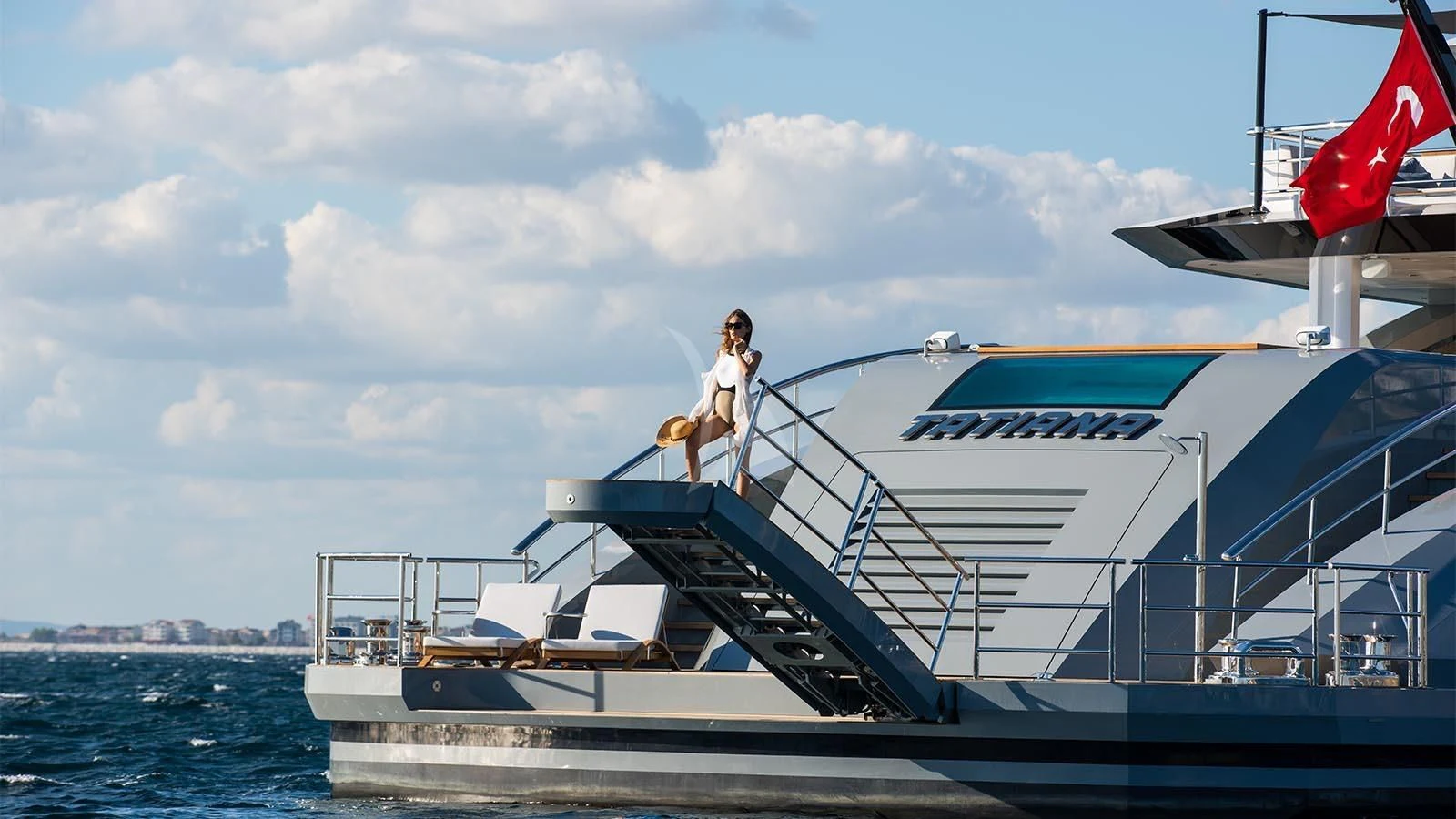 a person standing on a boat aboard TATIANA Yacht for Sale
