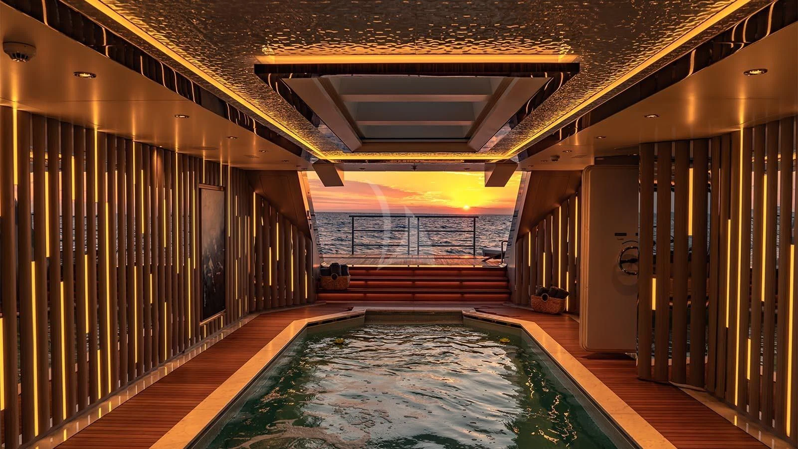a swimming pool in a building aboard TATIANA Yacht for Sale