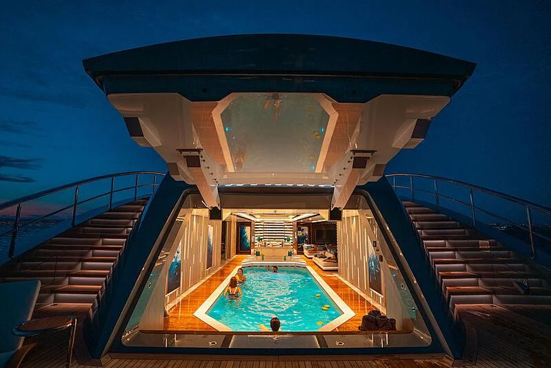 a swimming pool in a house aboard TATIANA Yacht for Sale