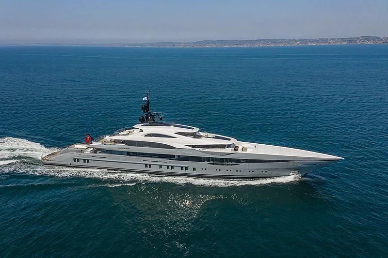 a large white ship in the water aboard TATIANA Yacht for Sale