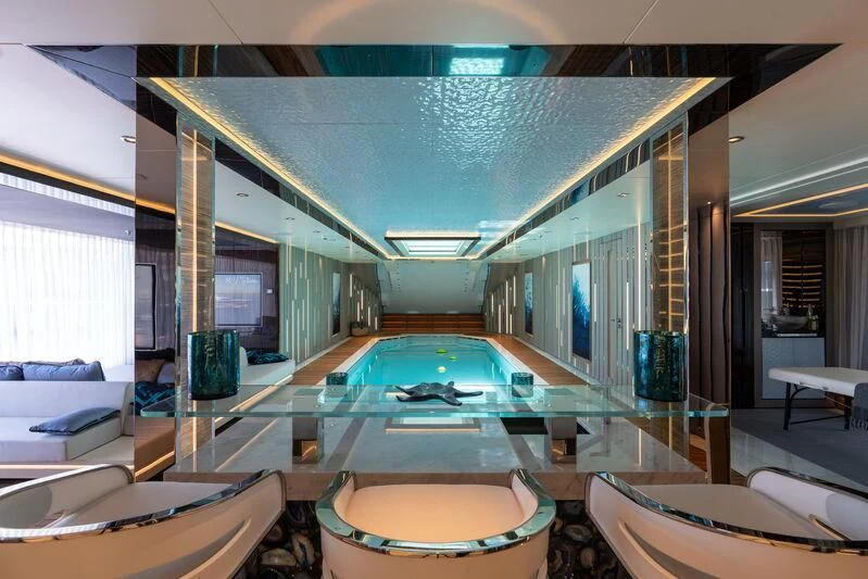a large indoor swimming pool aboard TATIANA Yacht for Sale