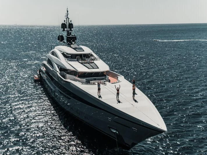 a large ship in the water aboard TATIANA Yacht for Sale