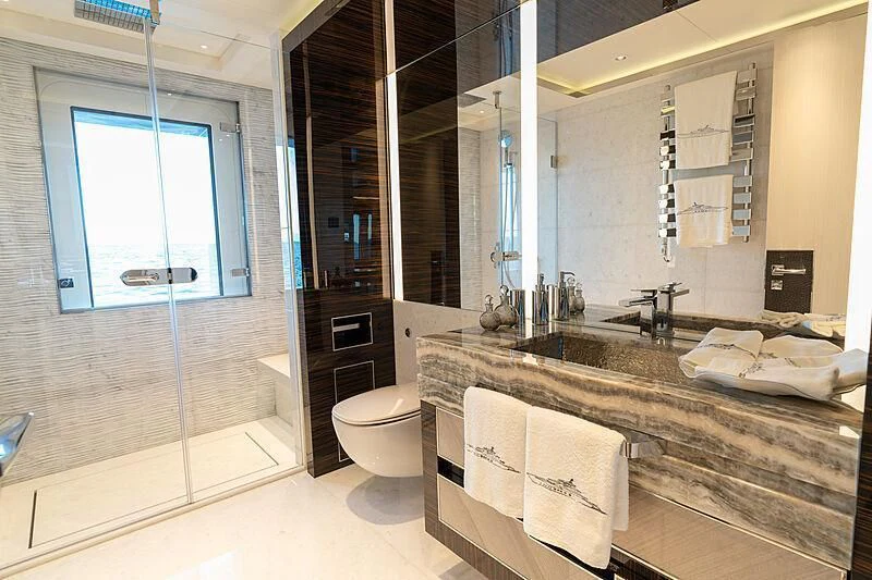 a bathroom with a large tub aboard TATIANA Yacht for Sale