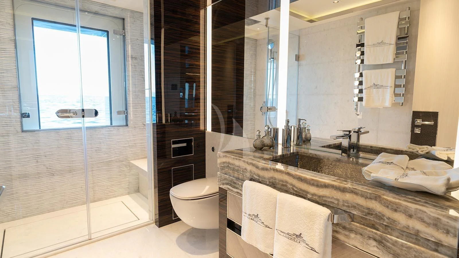 a bathroom with a large countertop aboard TATIANA Yacht for Sale