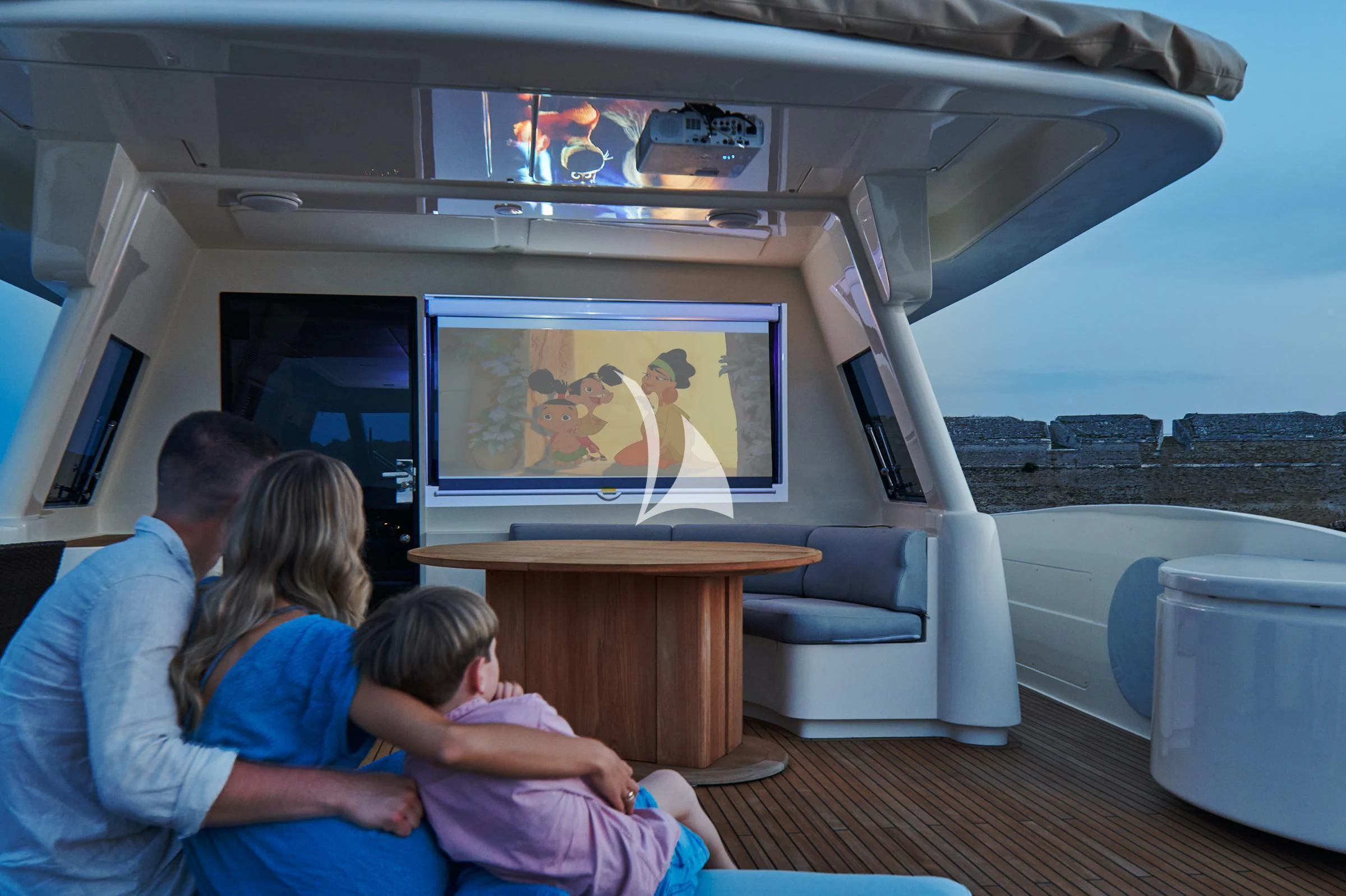 a group of people watching a television aboard FRIEND'S BOAT Yacht for Charter