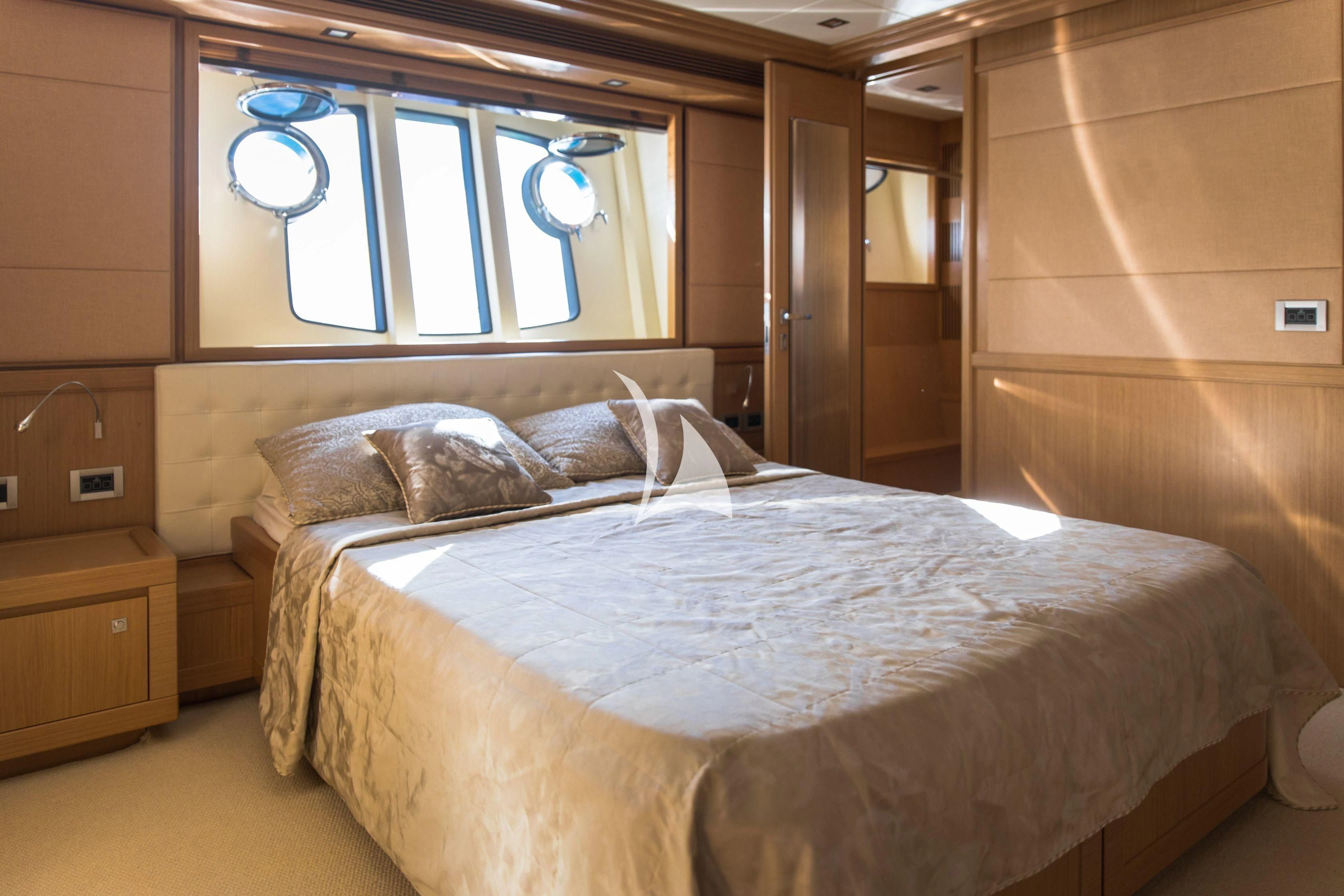 a bed in a cabin aboard FRIEND'S BOAT Yacht for Charter