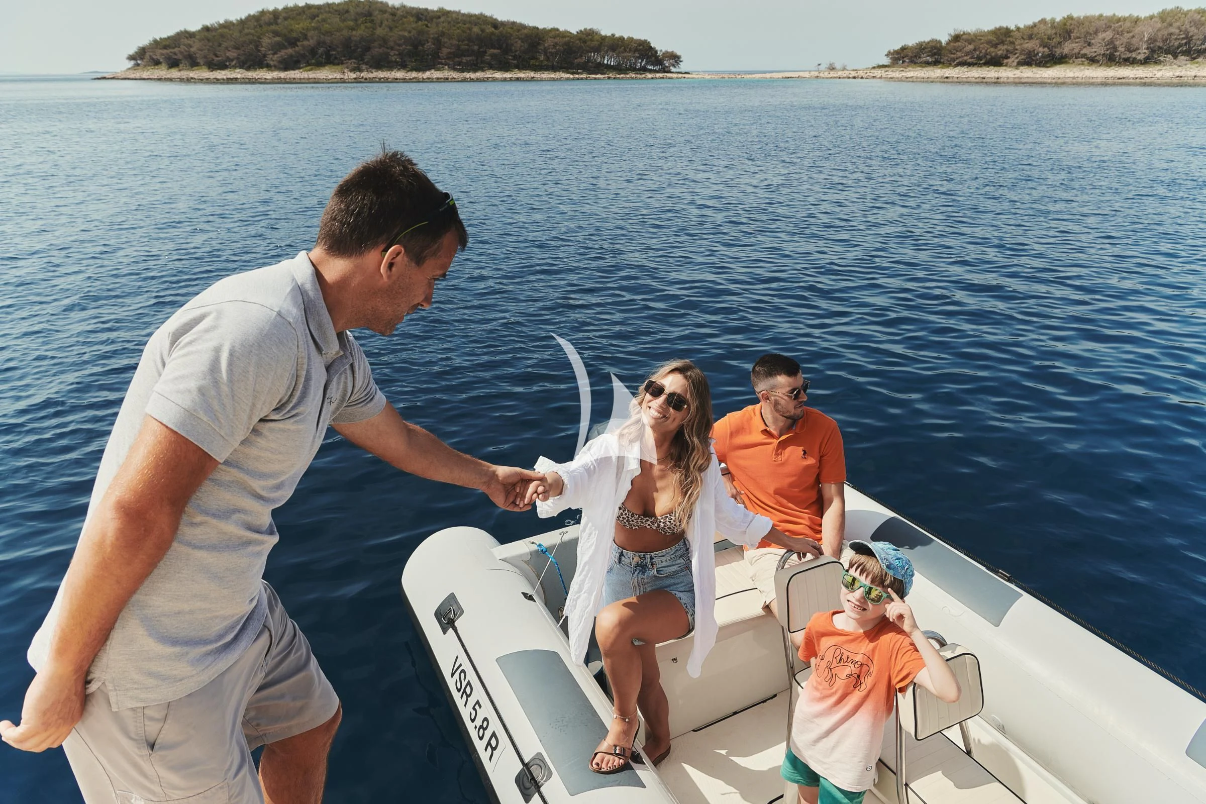 a man and woman on a boat aboard FRIEND'S BOAT Yacht for Charter