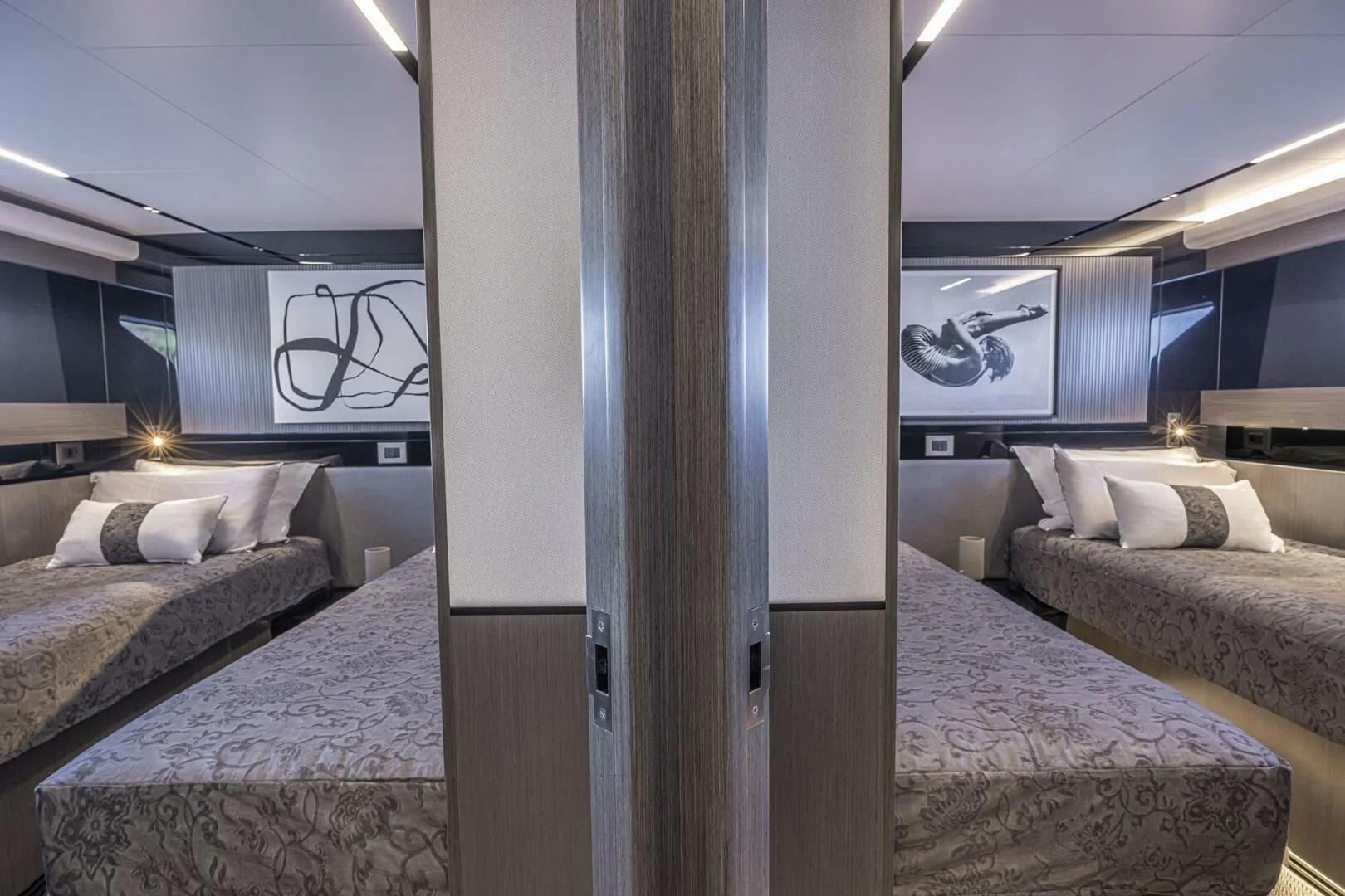 a room with a couple of beds aboard KNEAD IT Yacht for Sale
