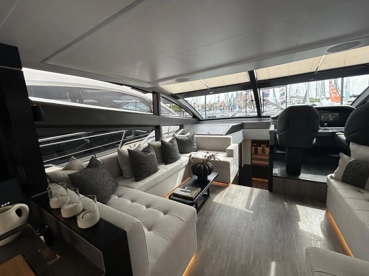 a room with a couch and a table aboard KNEAD IT Yacht for Sale