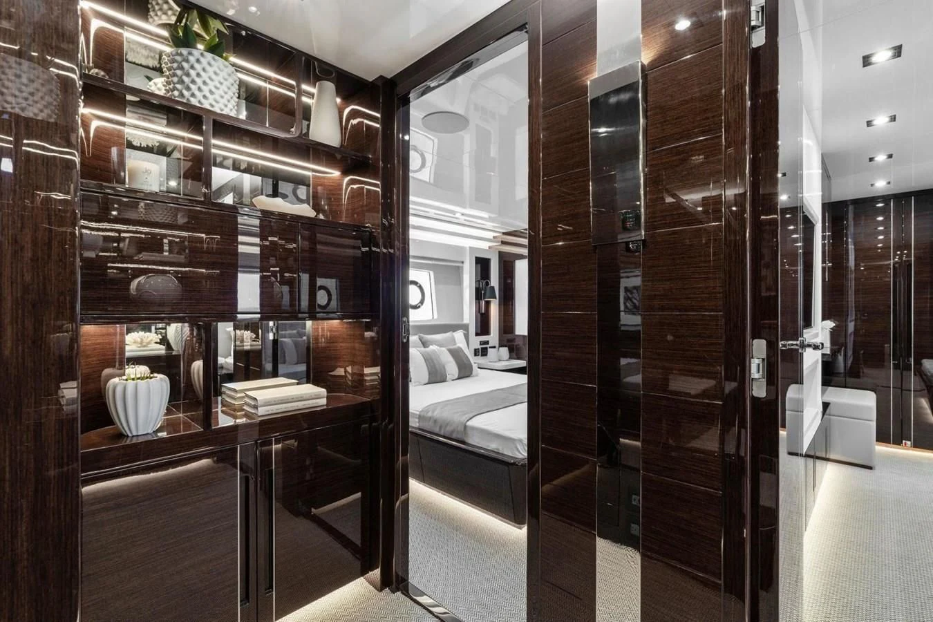 a room with shelves and a glass door aboard KNEAD IT Yacht for Sale
