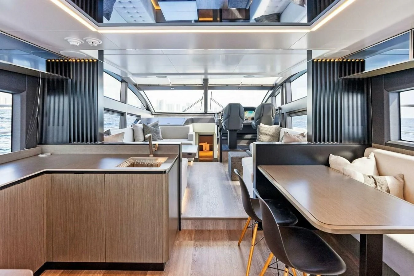 a room with a table and chairs aboard KNEAD IT Yacht for Sale