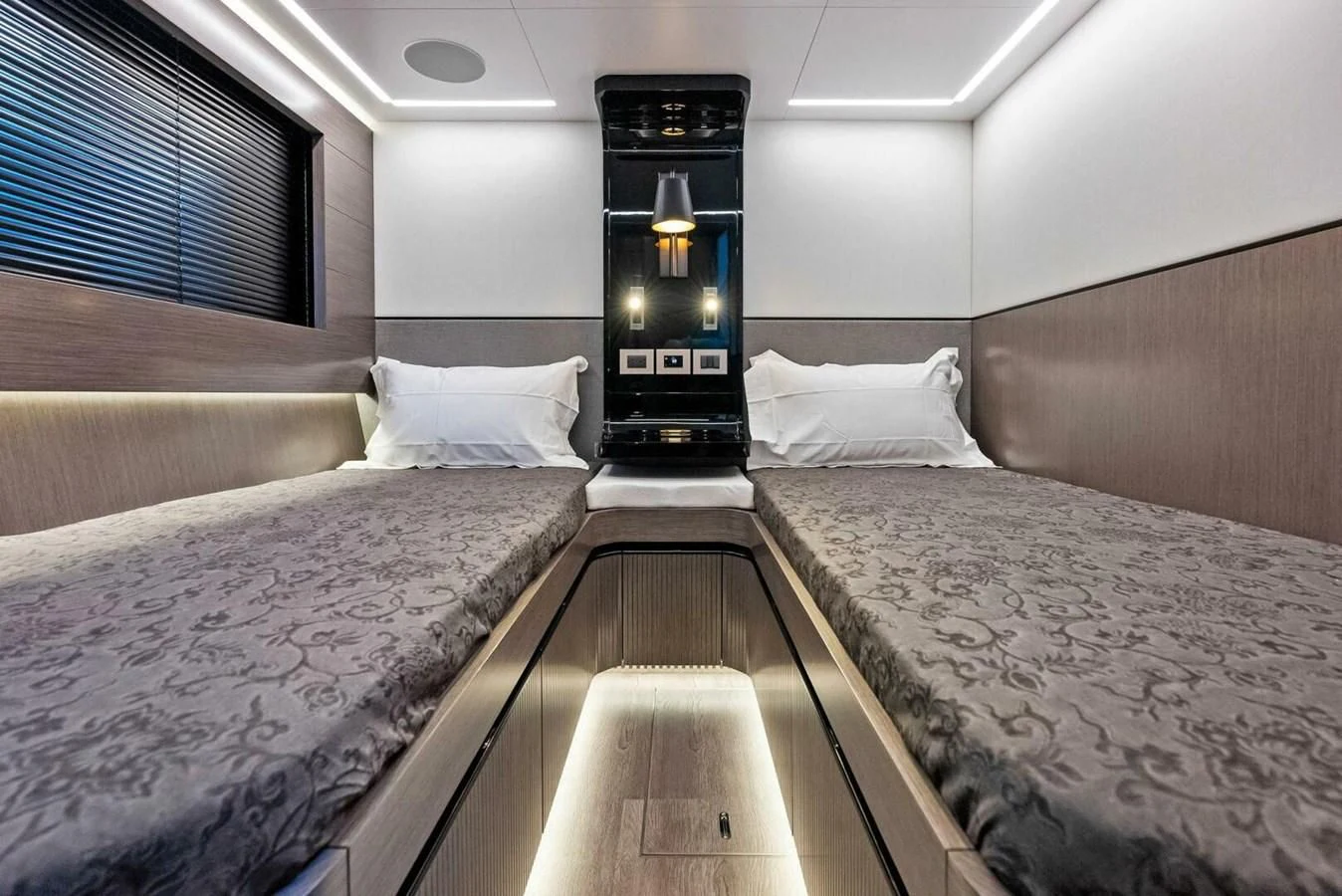a room with two beds aboard KNEAD IT Yacht for Sale