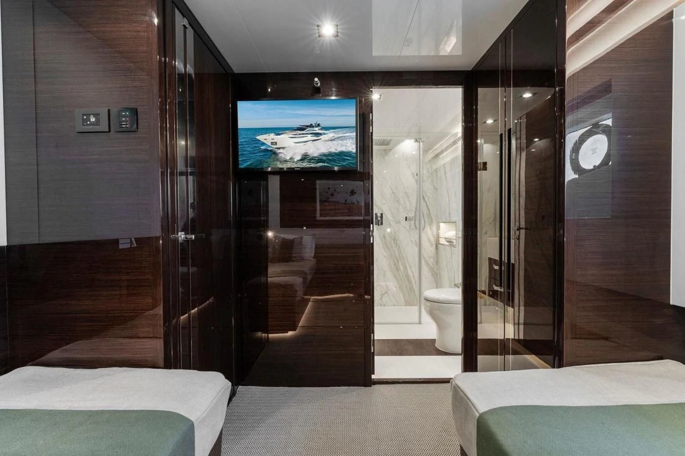 a bathroom with a large glass shower aboard KNEAD IT Yacht for Sale