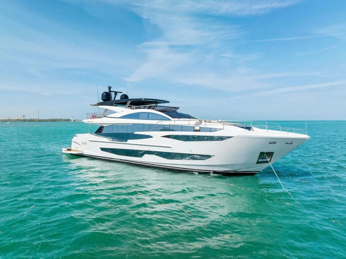 a white yacht in the water aboard KNEAD IT Yacht for Sale