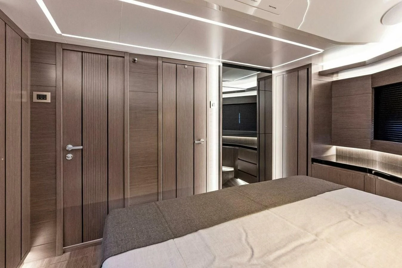 a room with a bed and a closet aboard KNEAD IT Yacht for Sale