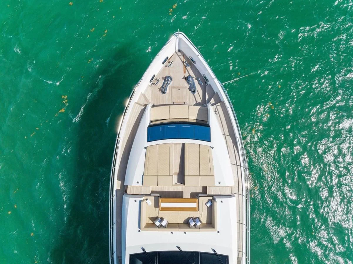 a white tower with a green background aboard KNEAD IT Yacht for Sale