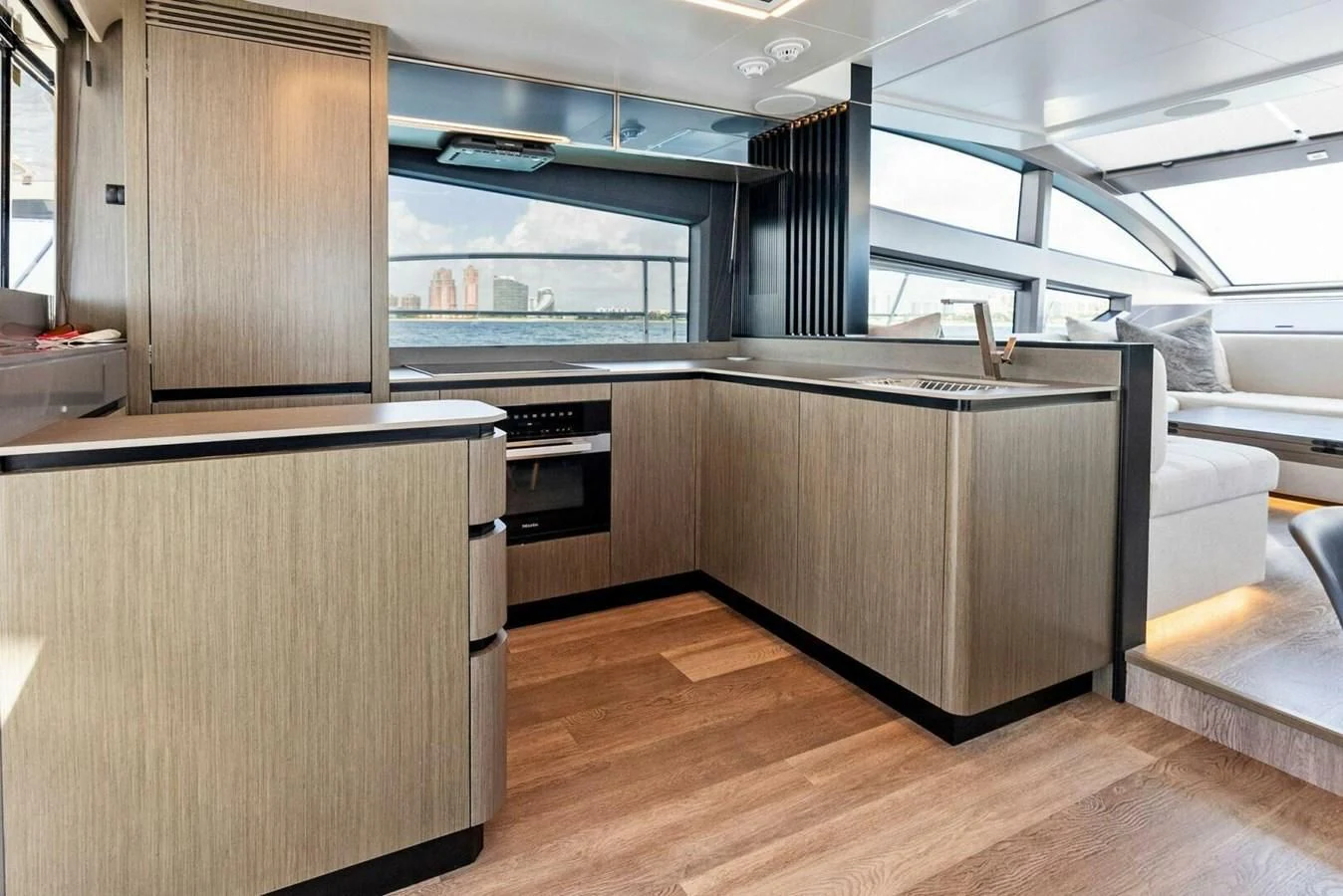a kitchen with a large window aboard KNEAD IT Yacht for Sale