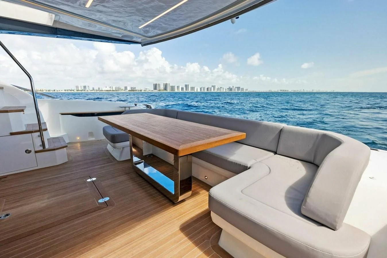 a room with a table and chairs aboard KNEAD IT Yacht for Sale