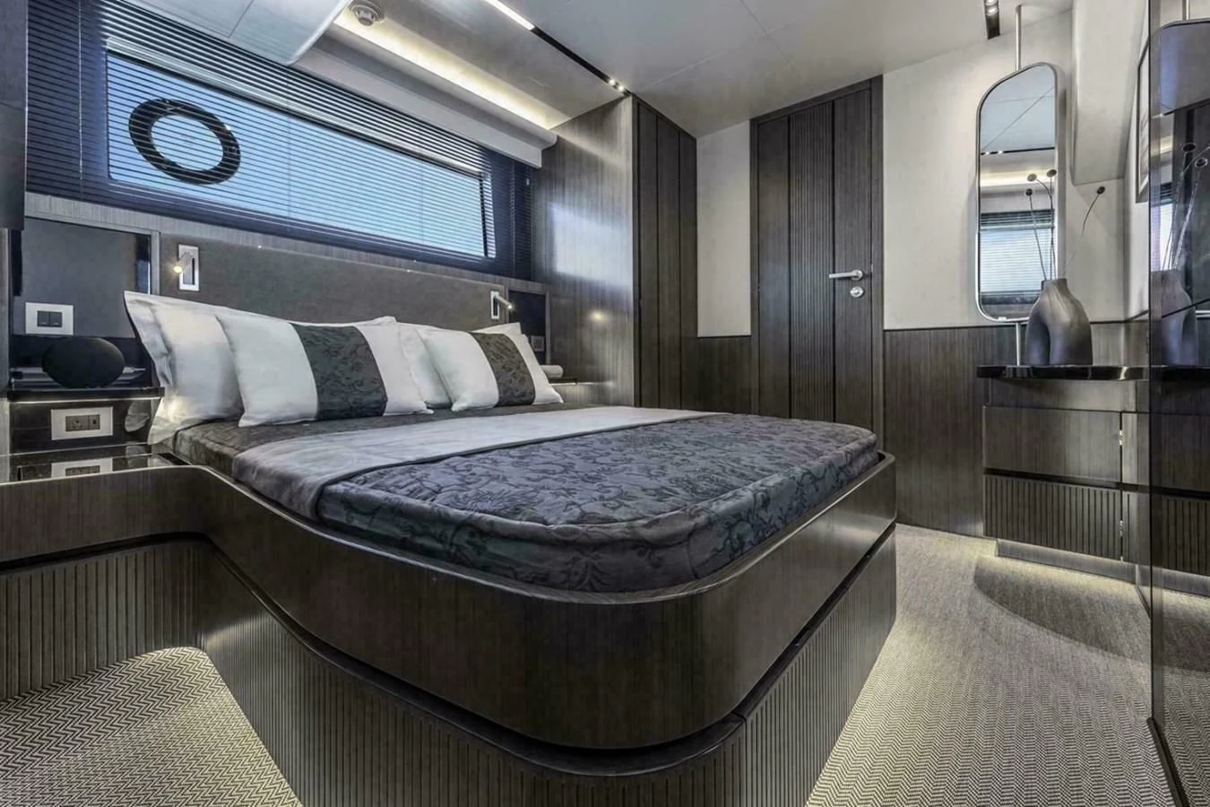 a bed in a room aboard KNEAD IT Yacht for Sale