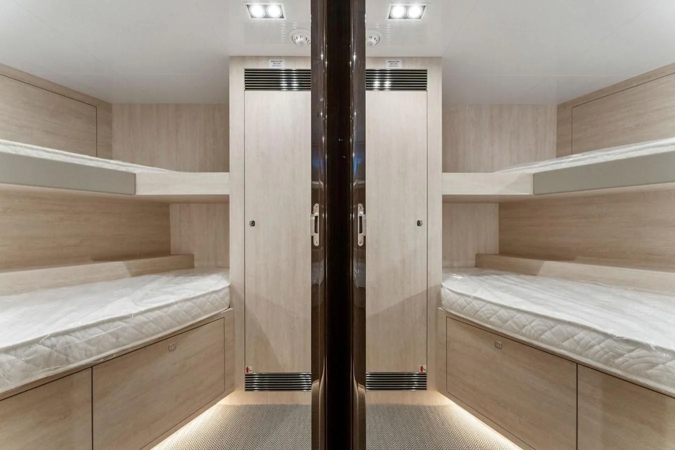 a room with bunk beds aboard KNEAD IT Yacht for Sale